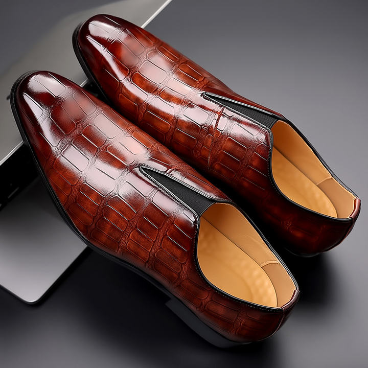Comfortable men's slip-on loafers with a stylish croc-embossed pattern, ideal for everyday fashion.