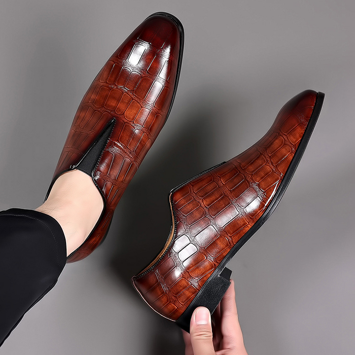 Versatile men's croc-embossed comfort loafers, suitable as dress shoes or for casual everyday wear.