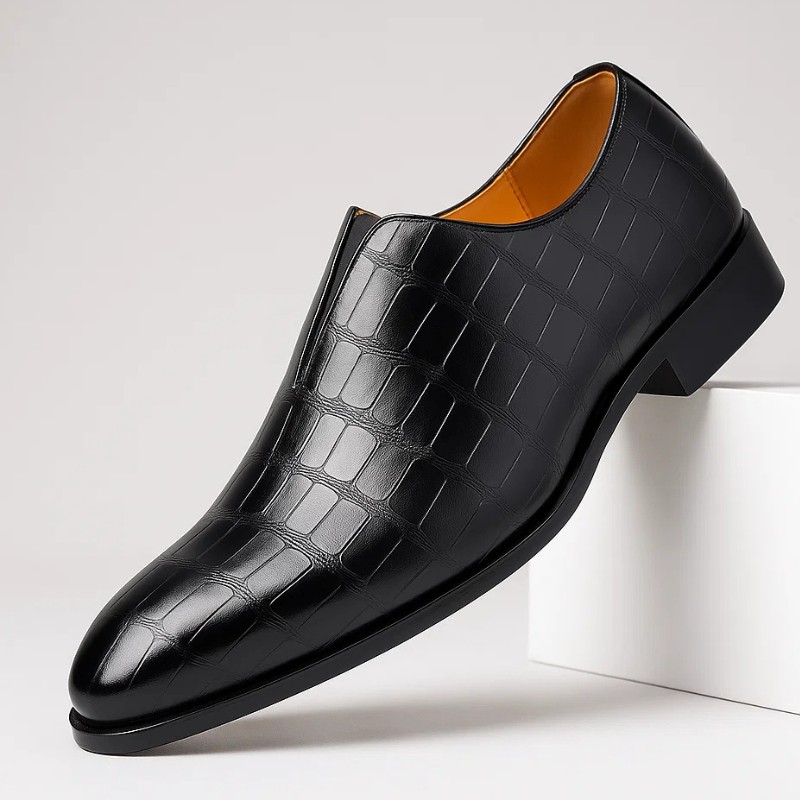 Men's stylish slip-on loafers featuring a unique croc-embossed pattern for refined casual elegance.