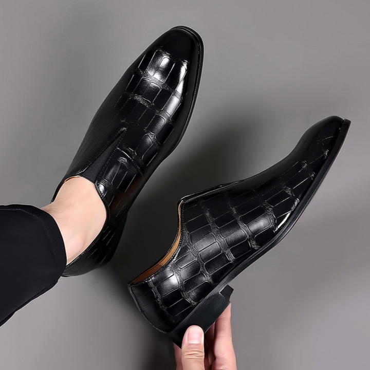 Sophisticated men's croc-embossed comfort loafers, a fashionable choice for modern men's footwear.
