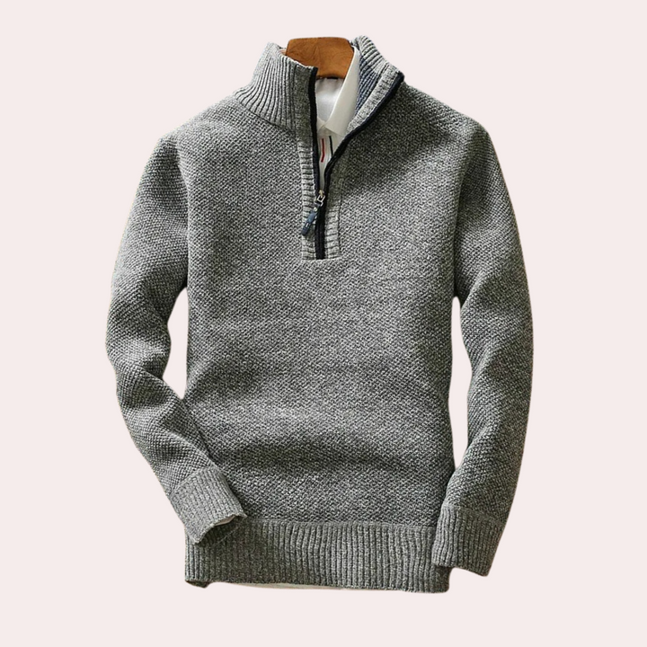 Textured knit men's high neck zip sweater, offering warmth and style for cold weather.