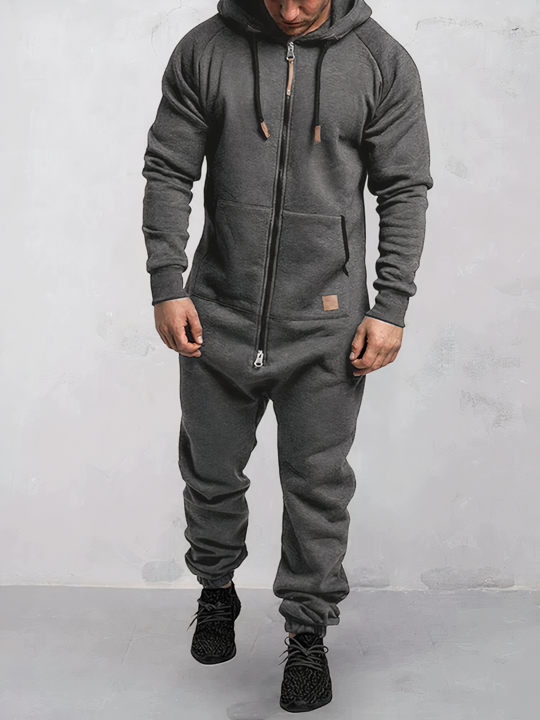 Athletic men's jogging suit with a cozy hoodie, designed for active lifestyles, workouts, and casual comfort.