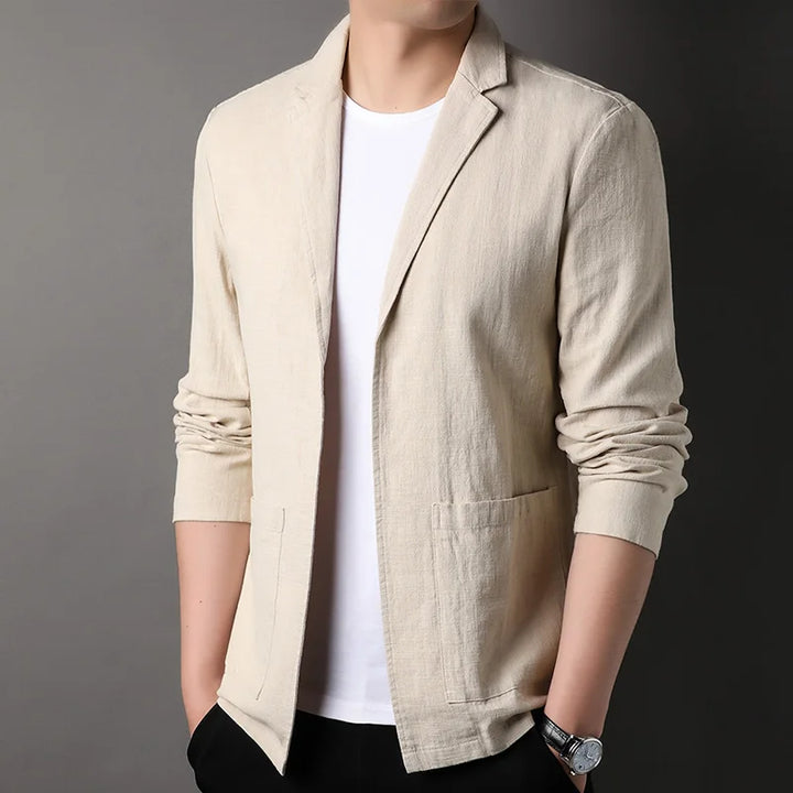Close-up of a men's lightweight summer blazer jacket, highlighting the breathable fabric for warm weather.