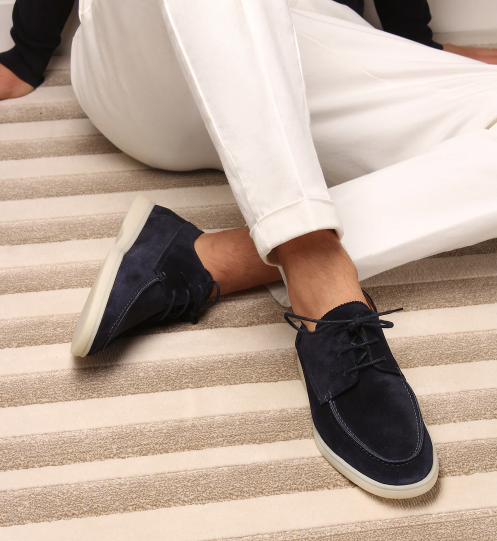 Stylish men's loafers in rich brown leather, perfect for effortless elegance & versatile everyday wear.