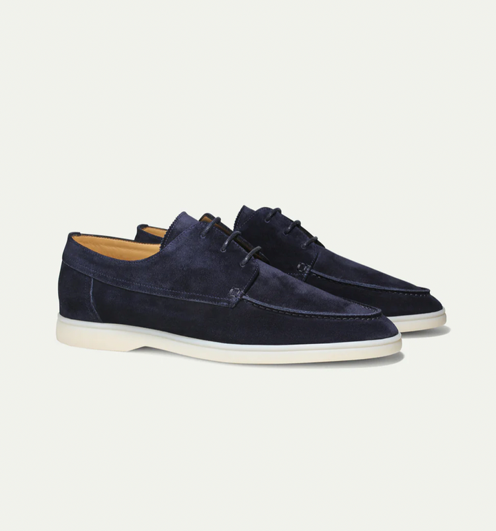 Comfortable men's slip-on loafers in classic black, ideal for casual wear & easy everyday fashion.