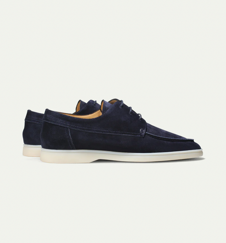 Mens fashion loafers in vibrant blue suede, a stylish choice for summer outfits & smart casual looks.