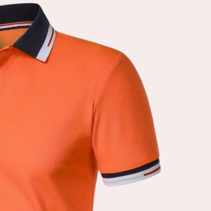 Modern men's orange polo shirt, Jules brand, a stylish and comfortable top for casual or smart-casual outfits.