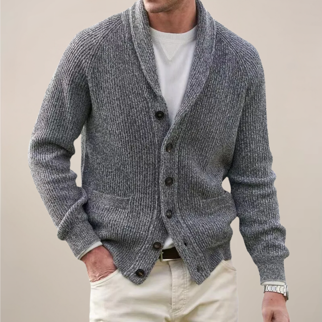 Men's button-up knit cardigan with a classic shawl collar, long sleeves & practical pockets for warmth and comfort.