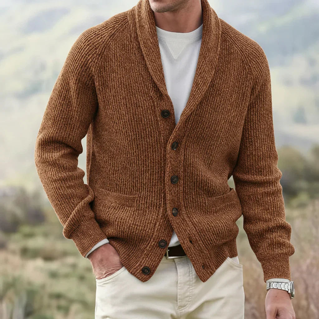 Detailed view of a men's knit shawl collar cardigan, showcasing knit texture & button-up closure for a stylish look.