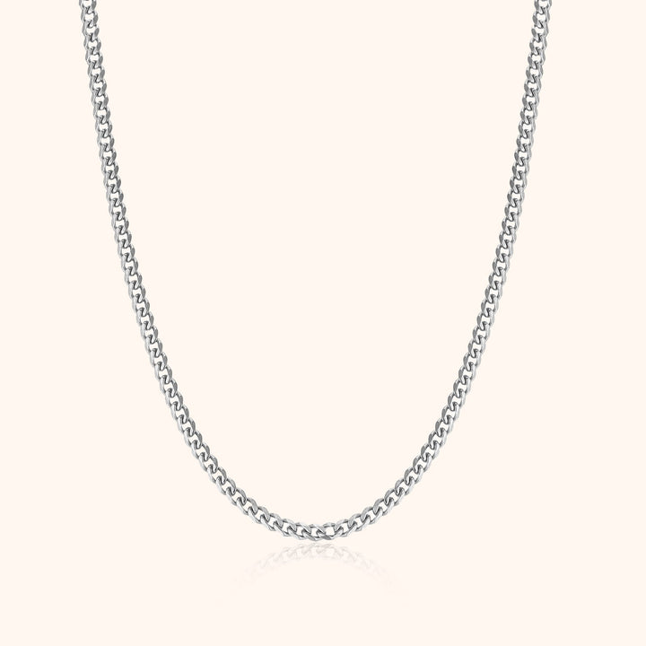 Stylish men's silver Cuban link necklace. Classic and durable men's chain, essential jewelry for fashion.