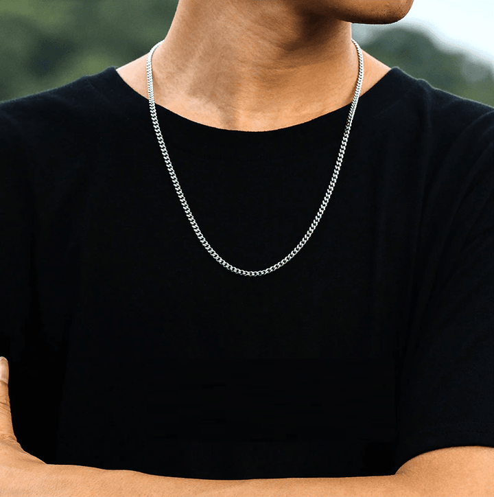 Bold black Cuban link necklace for men. Stylish, durable men's chain, a modern fashion jewelry piece.