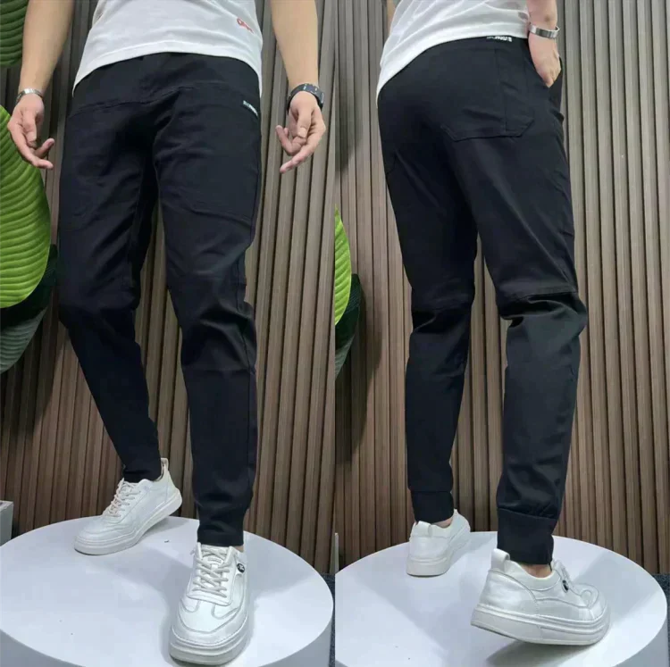 Versatile black men's cargo pants, offering comfortable stretch and a modern casual look.