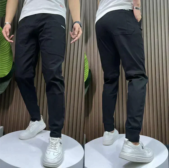 Versatile black men's cargo pants, offering comfortable stretch and a modern casual look.