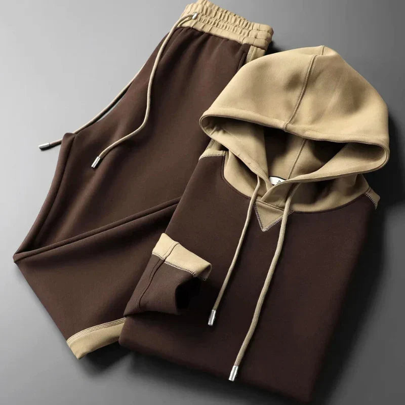 Comfortable men's two-tone lounge set. Relaxed fit matching casual wear for stylish men's fashion.