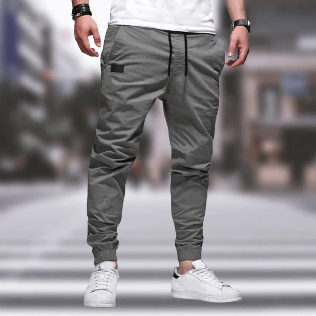 Stylish men's utility cargo trousers, perfect for casual wear, streetwear, and everyday comfort.