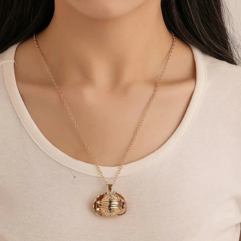 Adjustable layered memory locket necklace with multiple pendants for photos.