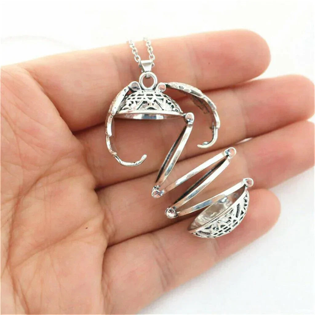 Fashionable multi-layer locket necklace, perfect for holding small photos and memories.