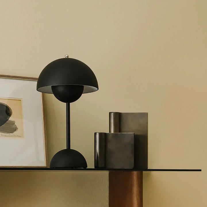 Decorative LED mushroom table lamp, MushLuxe. Modern lighting for desk or home decor, providing warm ambient light.