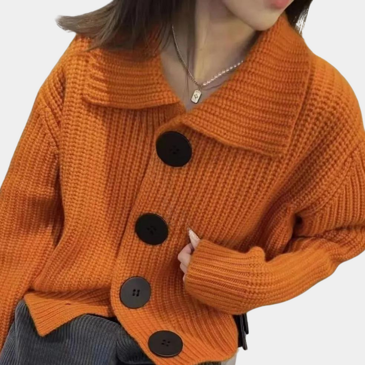 Stylish orange women's vest, a trendy layering piece perfect for modern casual chic outfits.