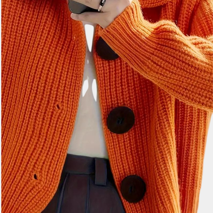 Chic orange women's vest, enhancing casual style with its trendy design and comfortable fit.