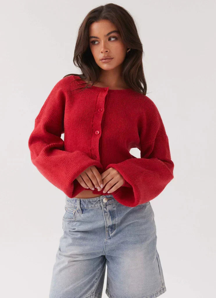 Elegant red long-sleeve women's cardigan. Button-front design, ideal layering piece for stylish casual & work outfits.