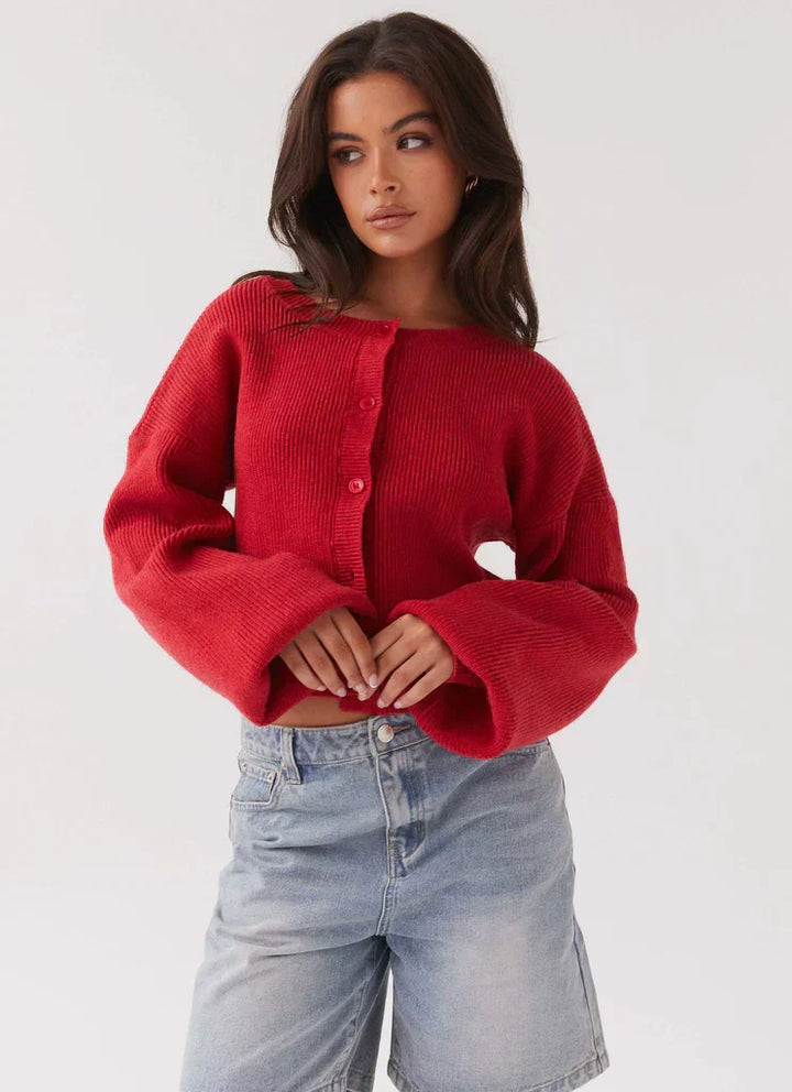 Elegant red long-sleeve women's cardigan. Button-front design, ideal layering piece for stylish casual & work outfits.