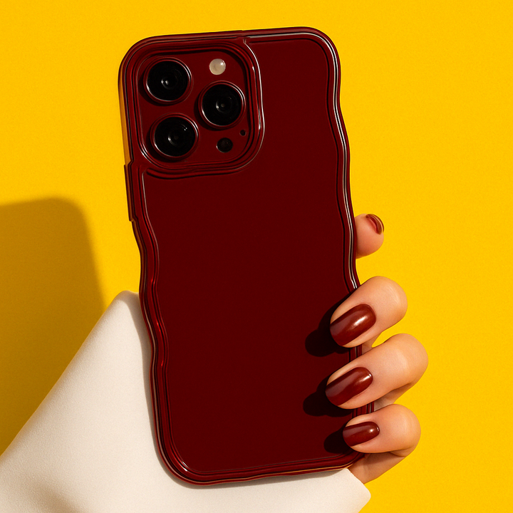 Stylish ripple iPhone case for women. Slim, glossy, protective phone cover with sculpted design.