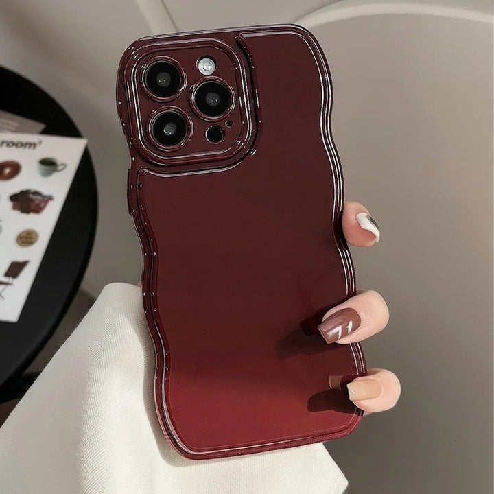 Glossy women's ripple iPhone cover. Stylish and slim, offering shockproof protection with a sculpted grip.