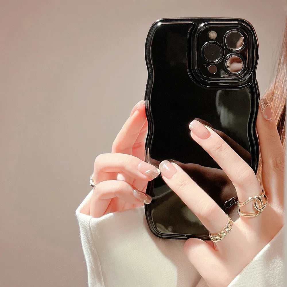 Sculpted ripple design iPhone case for women. Non-slip, glossy, and shockproof for ultimate phone protection.