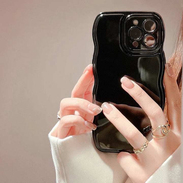 Sculpted ripple design iPhone case for women. Non-slip, glossy, and shockproof for ultimate phone protection.