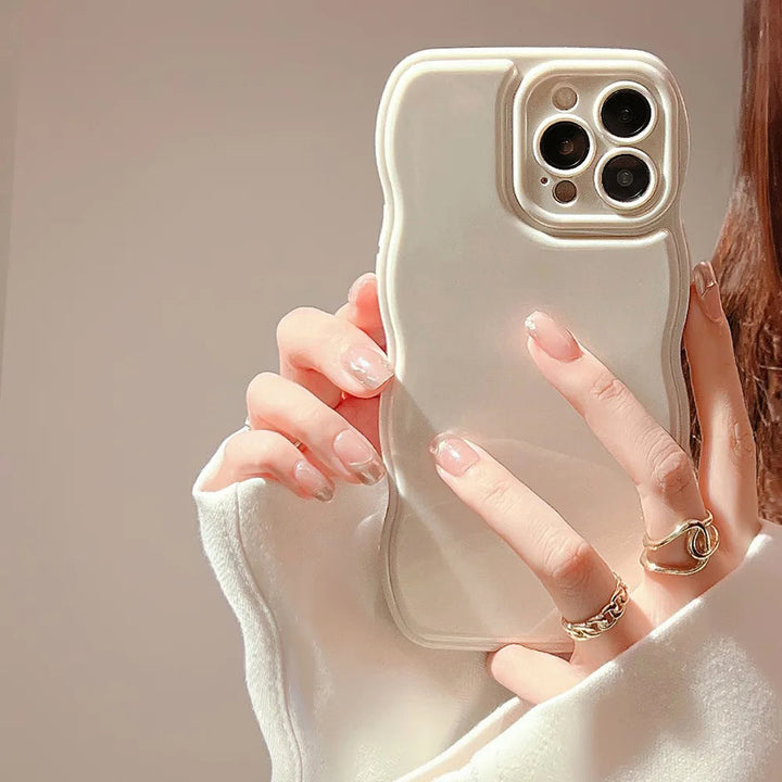 Trendsetting ripple pattern iPhone case. A sleek, protective women's phone cover with a glossy finish.