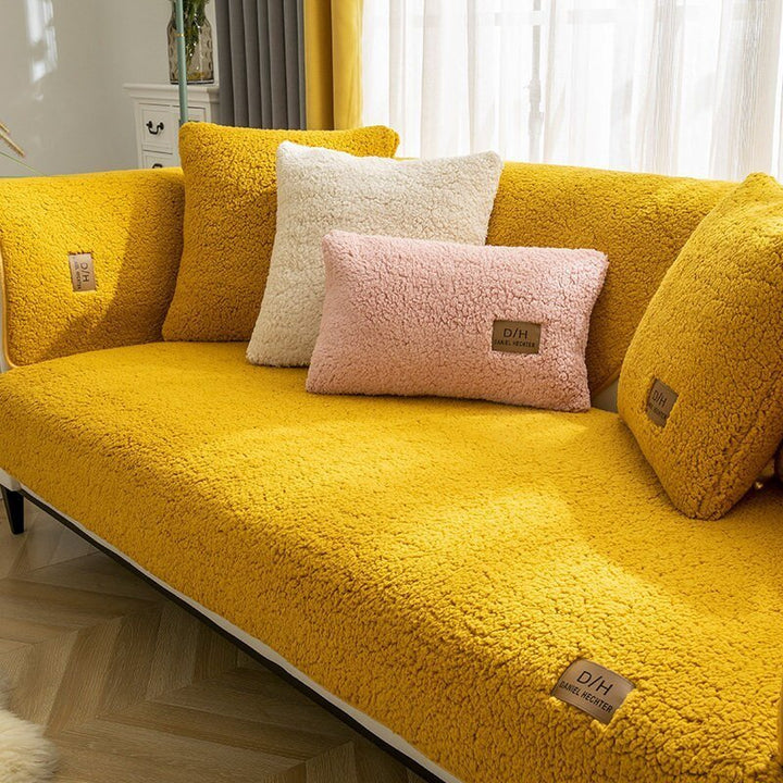 Durable universal stretch sofa cover made of polyester. Non-slip couch protector, machine washable for home decor.