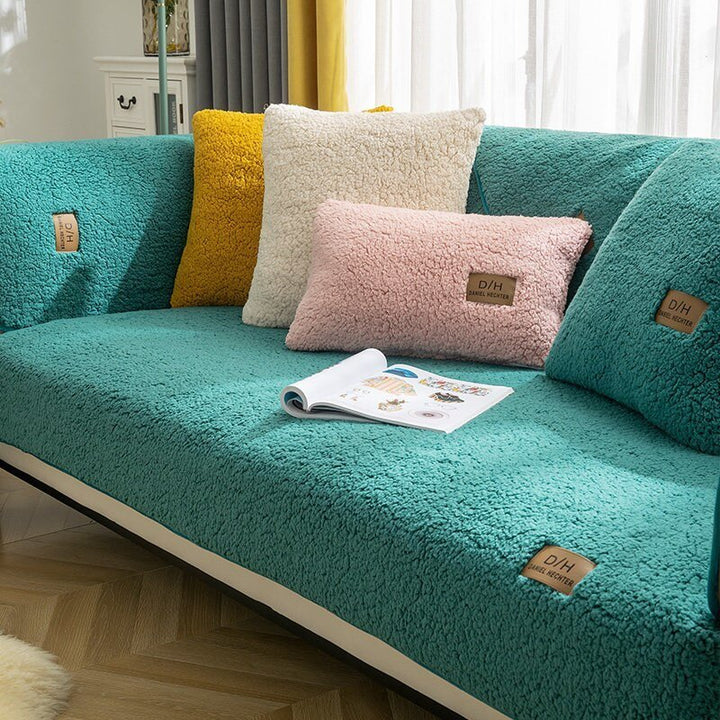 Easy-fit universal stretch sofa protector. This machine washable couch cover refreshes your home decor effortlessly.