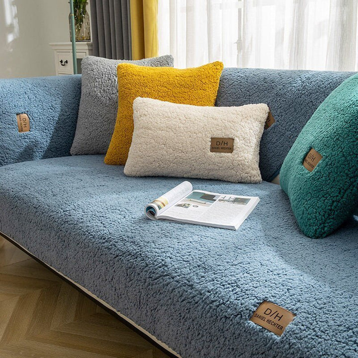 Soft polyester universal stretch sofa cover. Non-slip furniture protector, ideal for updating living room decor.