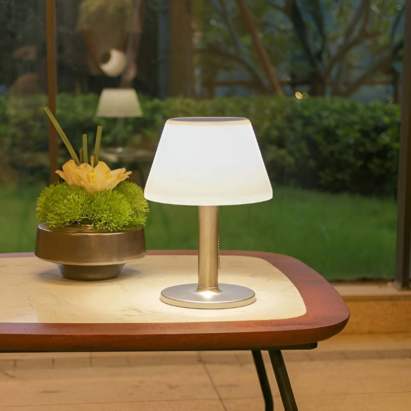 Stylish SolarLuxe outdoor table lamp with solar energy, perfect for garden, patio, or balcony. Eco-friendly ambient light.