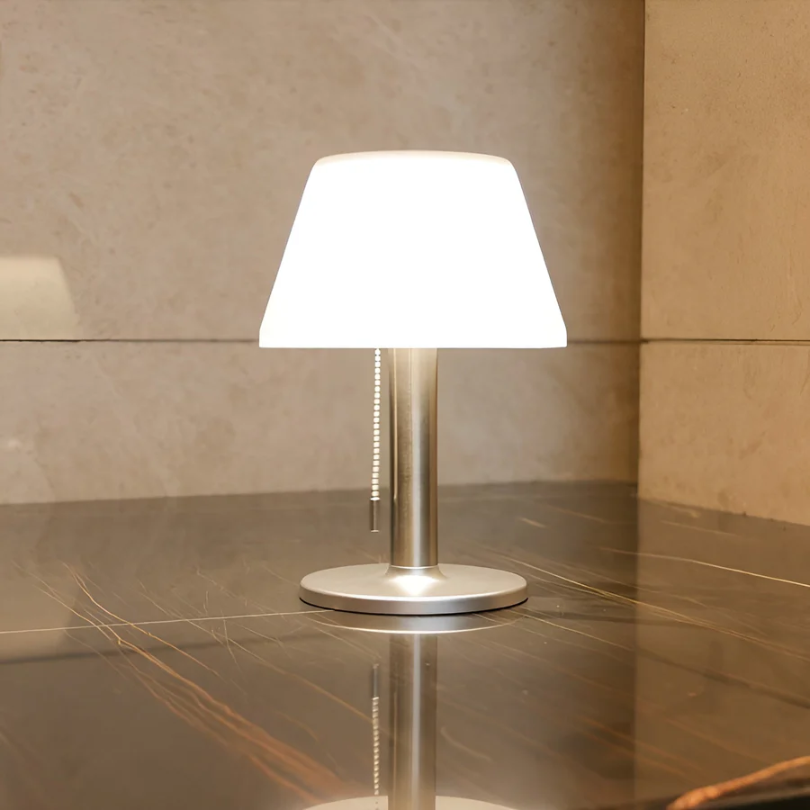 Elegant solar energy outdoor table lamp by SolarLuxe. Durable & weather-resistant patio lighting for ambient garden decor.