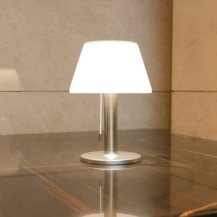 Elegant solar energy outdoor table lamp by SolarLuxe. Durable & weather-resistant patio lighting for ambient garden decor.