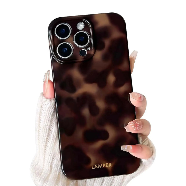 Premium tortoiseshell glass phone cover for iPhone, featuring a scratch-resistant finish and slim design.
