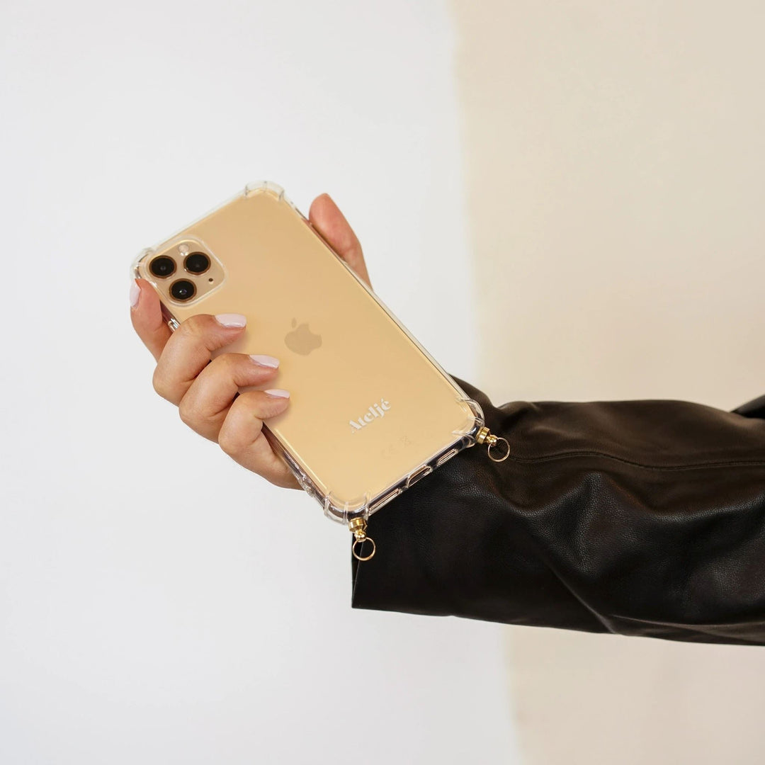 Fashionable protective phone case for hands-free use, featuring lanyard compatibility & slim fit. Durable TPU cover.