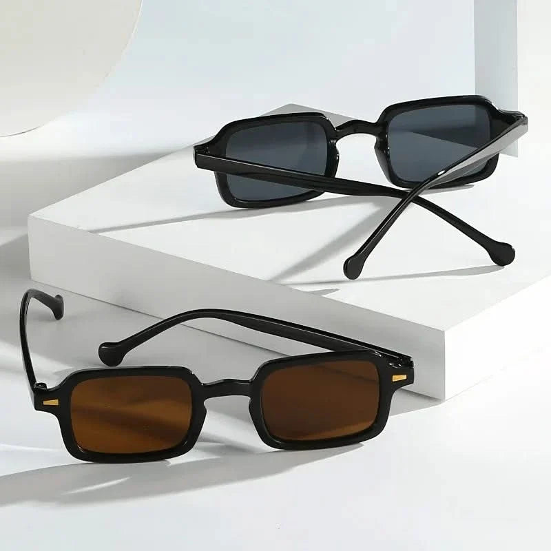 Lightweight black retro square frame sunglasses for men & women, offering stylish glare & UV protection.
