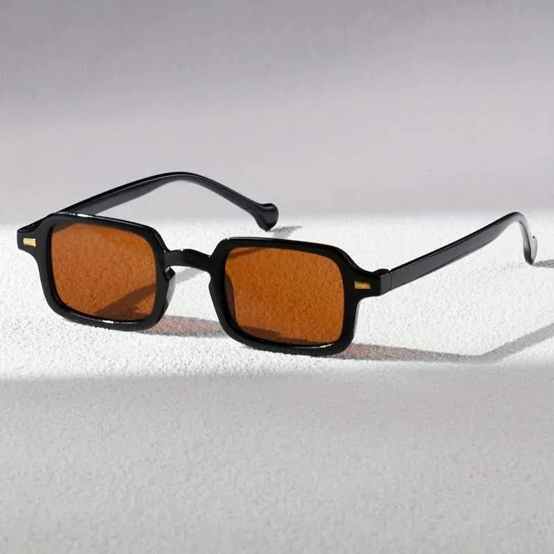Brown unisex retro square sunglasses. Essential stylish eyewear for fashion-forward men and women with UV protection.