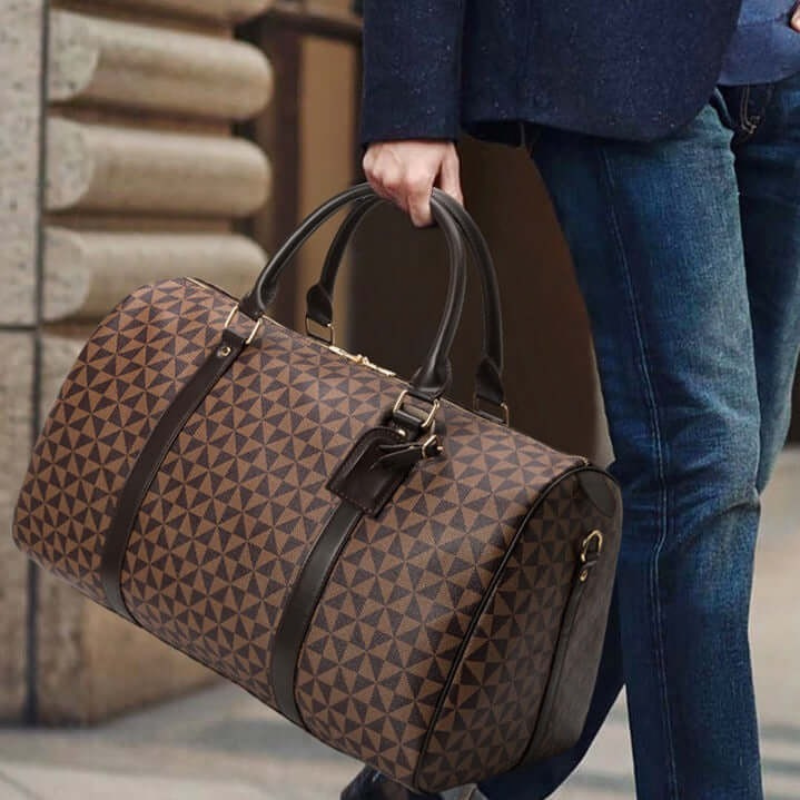 Spacious carry-on duffle bag, perfect as a unisex gym bag or weekend travel accessory. Durable & stylish design.