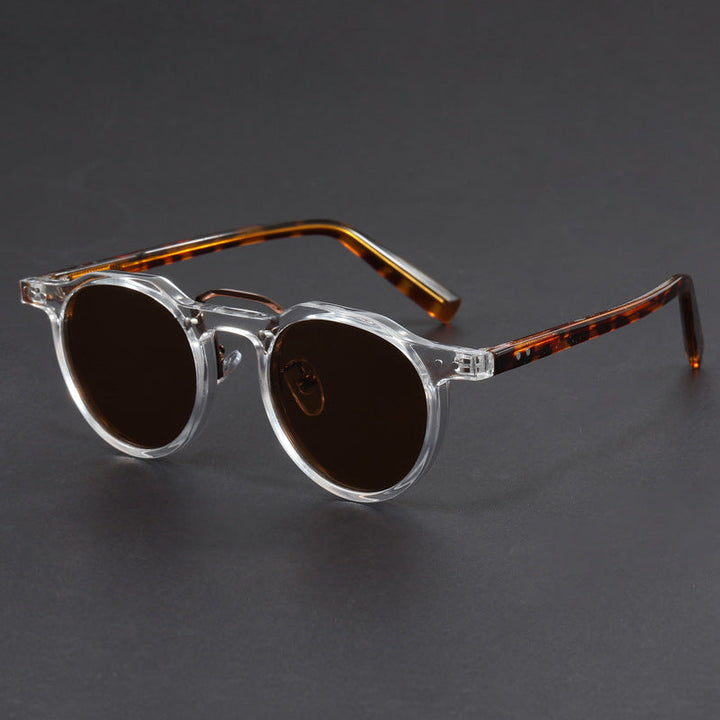 Stylish unisex UV400 sunglasses, modern black frame, offering essential eye protection for sunny days. Lightweight eyewear.