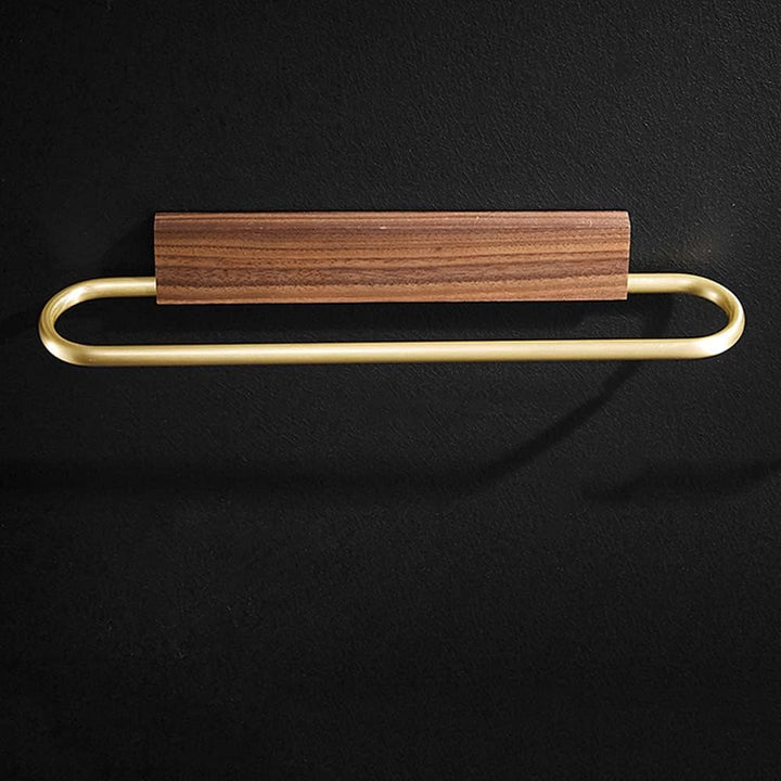 Minimalist walnut & brass bathroom towel bar. Sleek wood design, perfect for modern home organization.