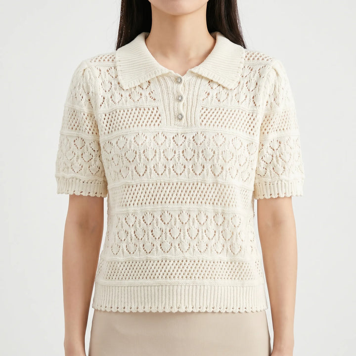 Lightweight women's pullover crochet blouse in white with short sleeves, ideal for elegant summer outfits.