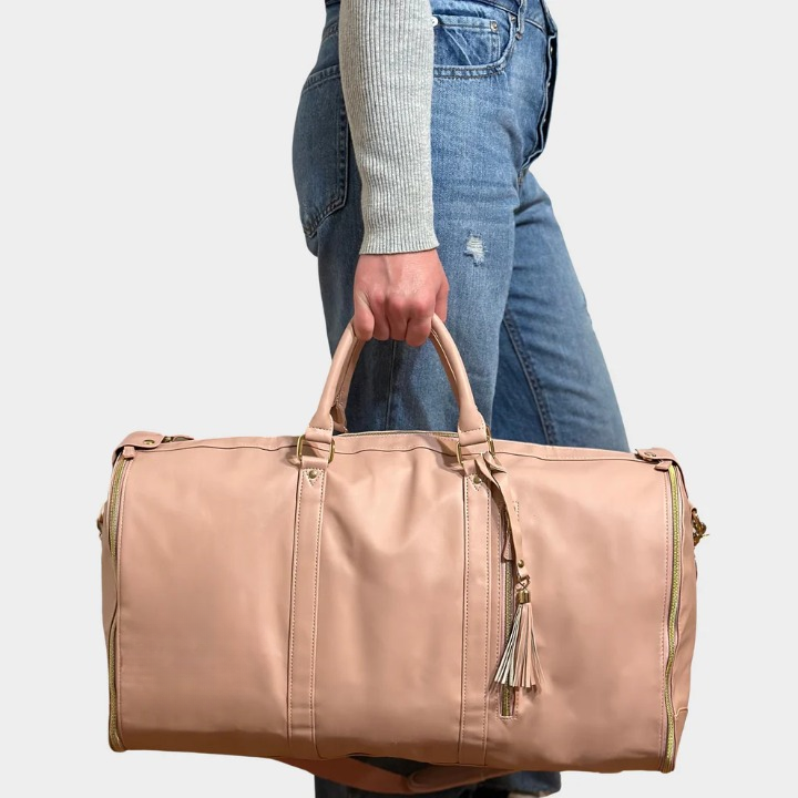 Women's garment duffel bag keeps suits & dresses wrinkle-free. Ideal 2-in-1 travel companion for business trips.