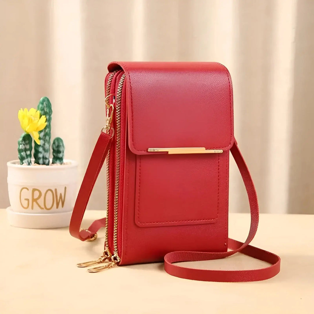 Trendy pink women's anti-theft leather crossbody bag with RFID protection, stylish & secure.