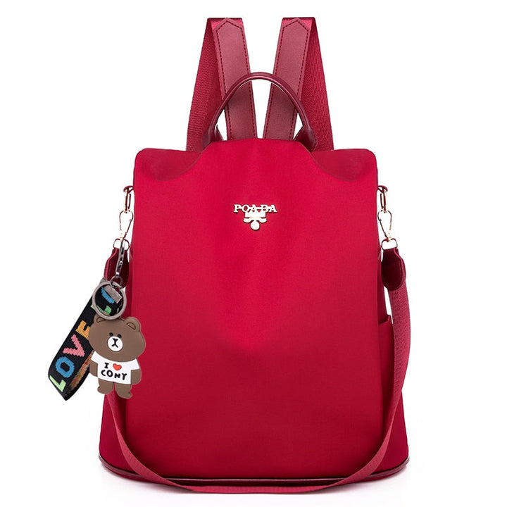 Women's multi-pocket anti-theft backpack made of water-resistant oxford for fashion & travel.