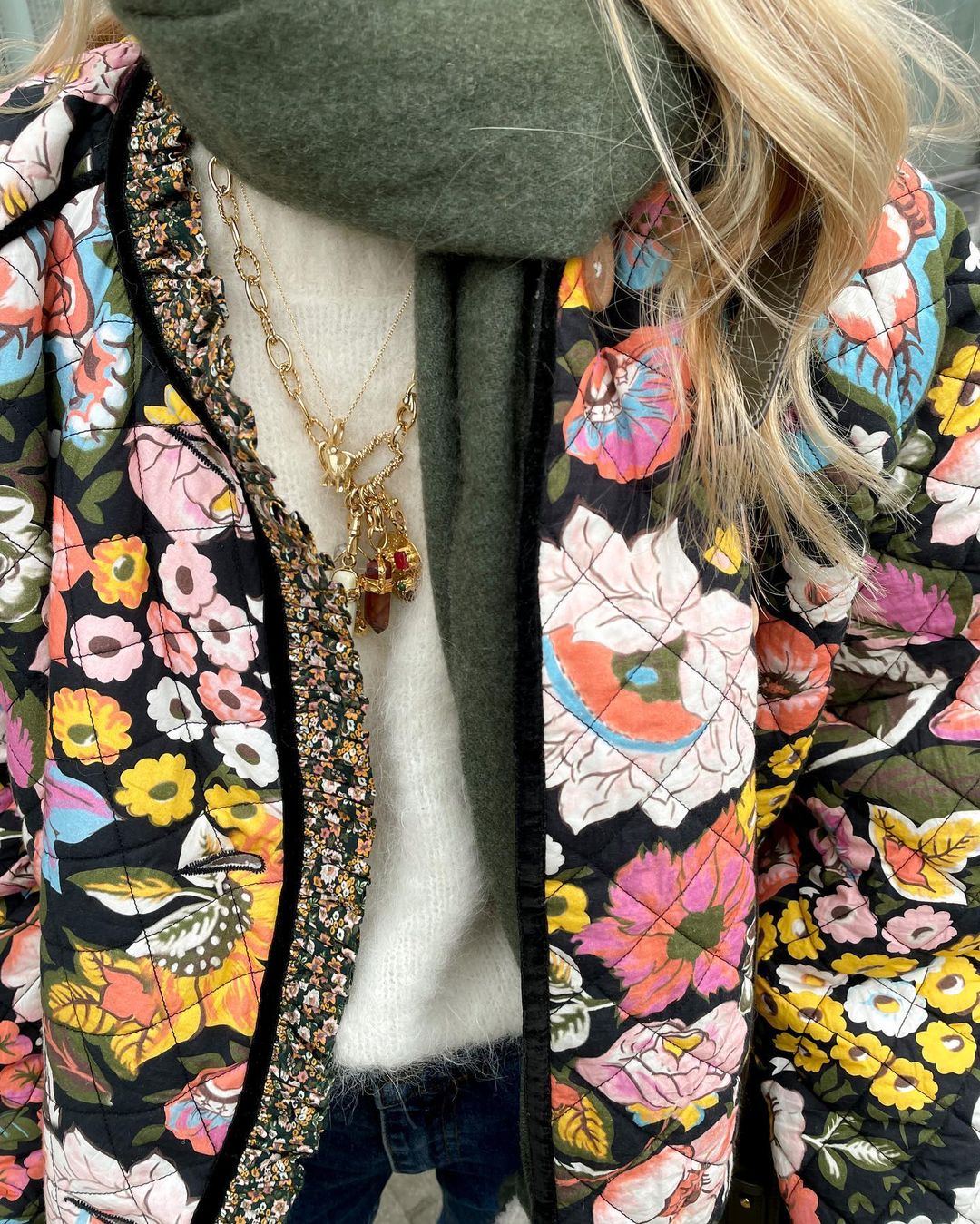 Warm women's Aurora floral print padded jacket, perfect for winter. Stylish and comfortable outerwear.