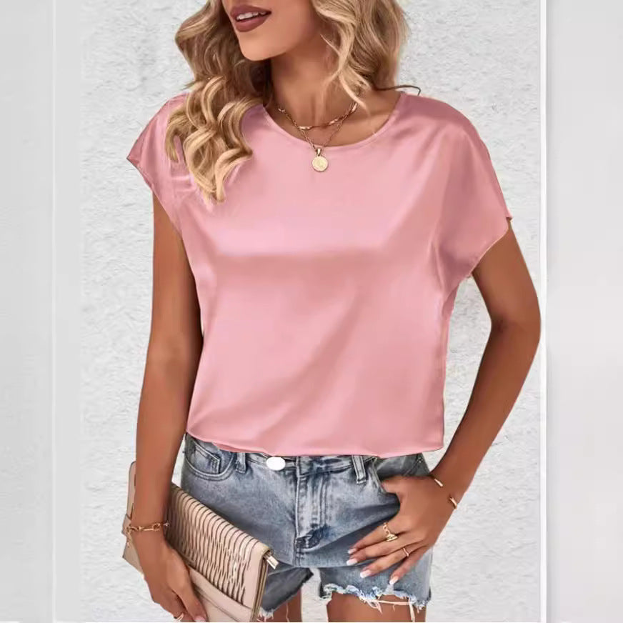 Trending women's batwing sleeve blouse. Versatile round neck top for stylish everyday wear.